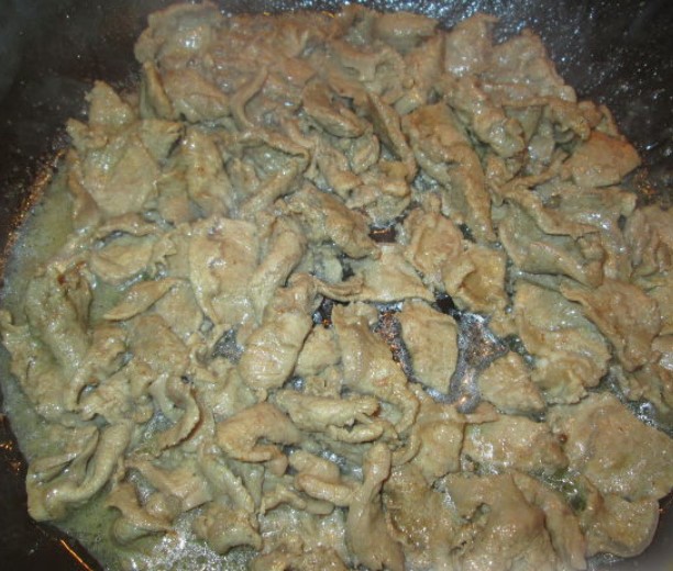 Quickly fry the veal in a hot skillet with a thick bottom