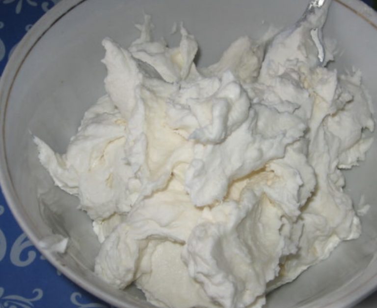 Meringue Cake with Cream and Pomegranate