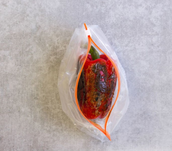 Place the fried or baked bell peppers in a bag, seal and let sit