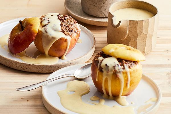 Baked Apple with Snickers and Vanilla Sauce