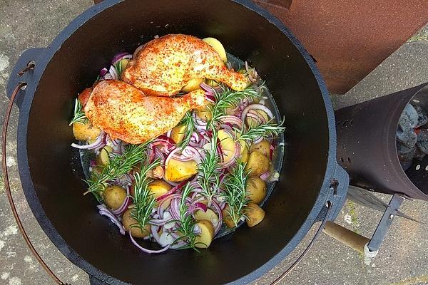 Chicken Legs on Rosemary Potatoes from Dutch Oven