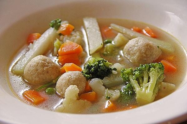 Clear, Colorful Vegetable Soup Made from Small Bread Dumplings