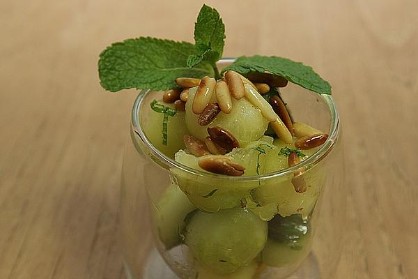 Cucumber and Melon Salad with Pine Nuts and Mint Leaves