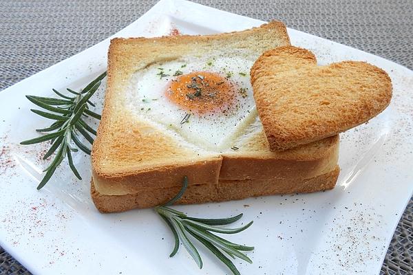 Eggs in Toast with Rosemary Butter