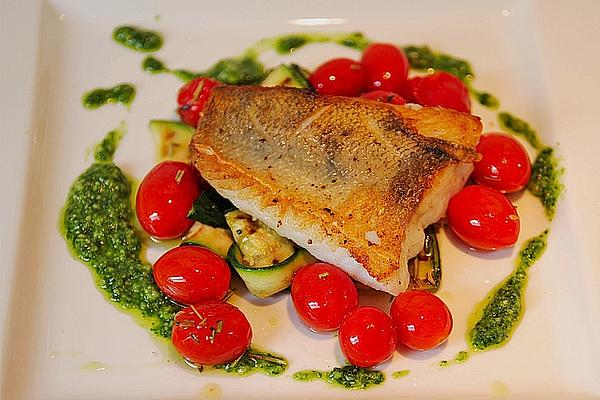 Fish Fillet Fried on Skin on Grilled Courgette Vegetables with Wild Garlic Pesto and Marinated Tomatoes
