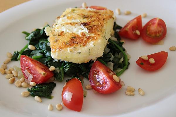 Fried Feta Cheese on Spinach Leaves