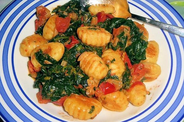 Gnocchi with Tomatoes and Spinach Leaves