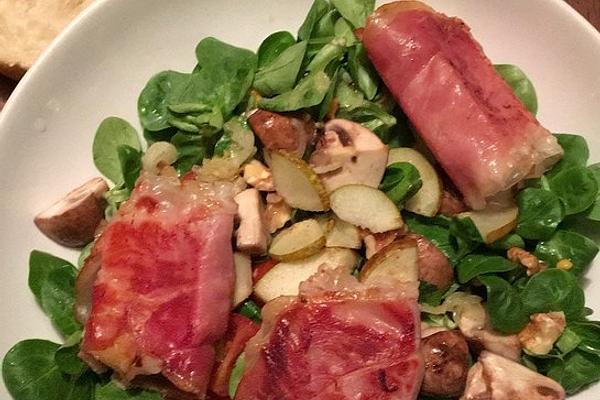 Goat Cheese Wrapped in Ham on Bed Of Rocket or Lamb`s Lettuce