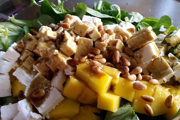 Mango and Feta Cheese on Lamb`s Lettuce with Pine Nuts