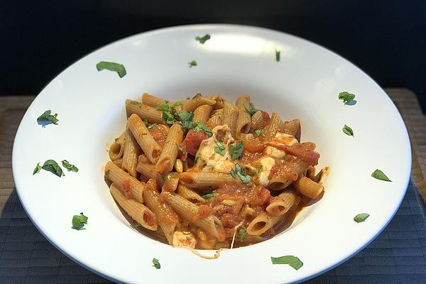 Pasta in Red Pesto Sauce with Pine Nuts and Mozzarella
