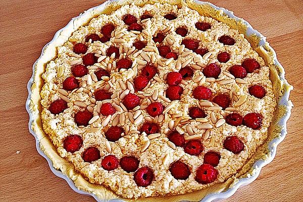 Tart with Almond Filling, Raspberries and Pine Nuts