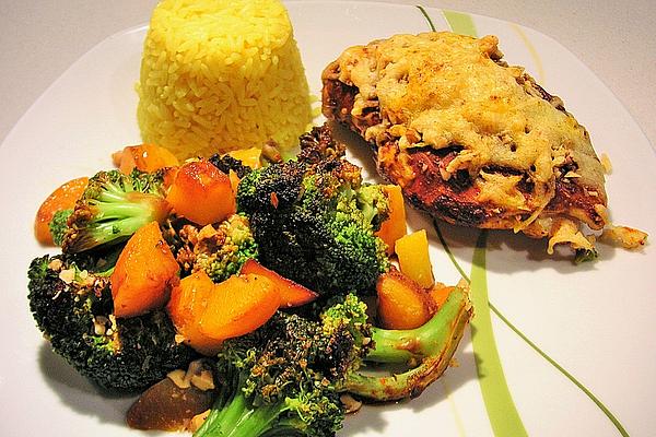 Baked Chicken Fillets with Nut Crust on Broccoli and Peach