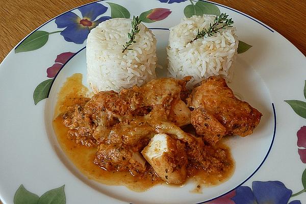 Baked Fish Fillet with Tomato Sauce and Cheese