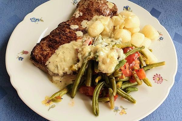 Beef Steaks with Tomato Beans and Cheese Sauce