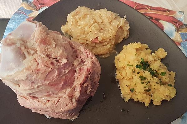 Berlin Pork Knuckle on Sauerkraut with Pea Puree