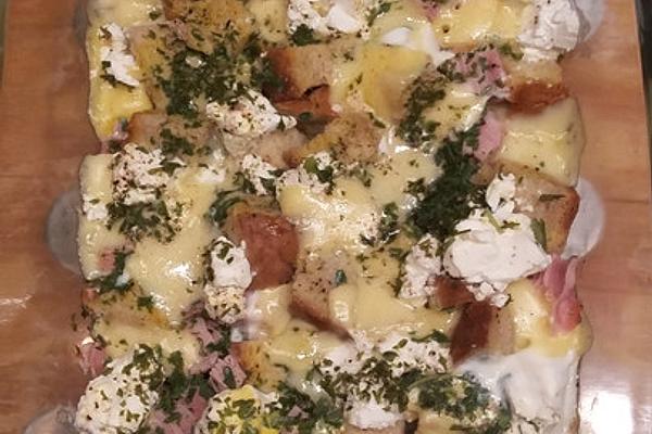 Bread Casserole with Ham, Mountain Cheese and Fresh Goat`s Cheese