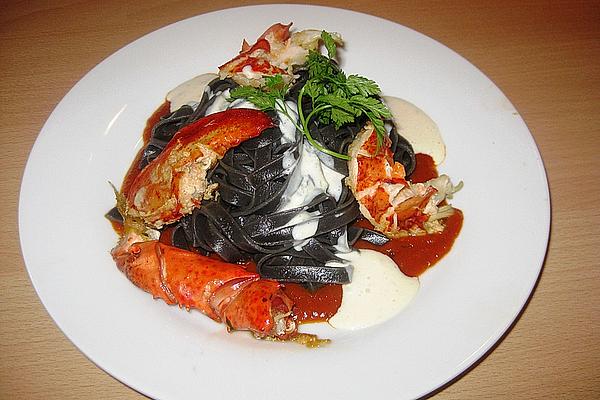 Breton Lobster with Black Tagliatelle and Parmesan Foam