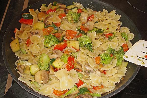 Butterfly Noodles Under Colorful Pan Of Vegetables