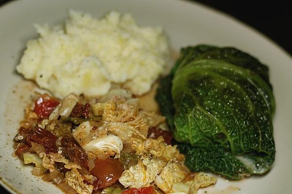 Cabbage Rolls Made from Savoy Cabbage in Bed Of Vegetables