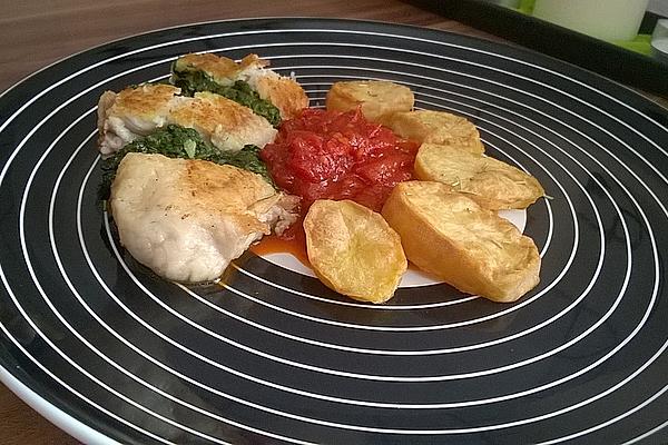Catfish Fillet on Baby Spinach and Basil Pesto with Tomato Confit and Baked Potatoes