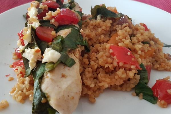 Chicken Breast Fillet Baked on Couscous with Tomatoes, Wild Garlic and Feta Cheese