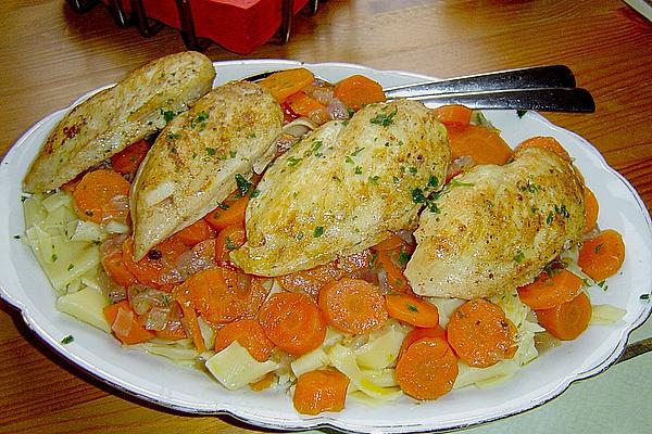 Chicken Breast Fillet on Bed Of Carrots and Onions