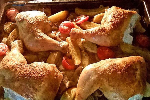 Chicken Drumsticks on Potatoes – Tomatoes – Onion Vegetables