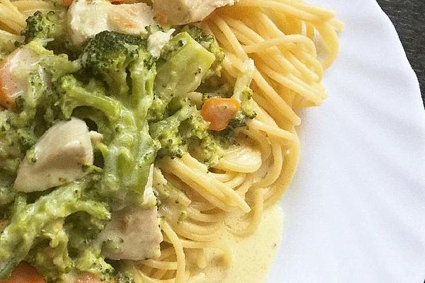 Chicken with Broccoli and Carrots in Creamy Cheese Sauce with Rice