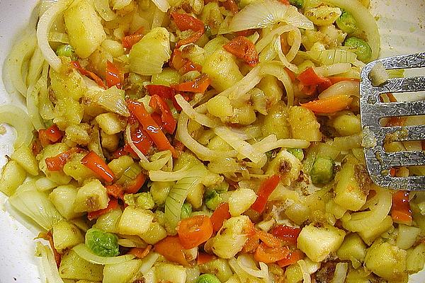 Colorful Fried Potatoes with Onions, Pointed Peppers and Brussels Sprouts