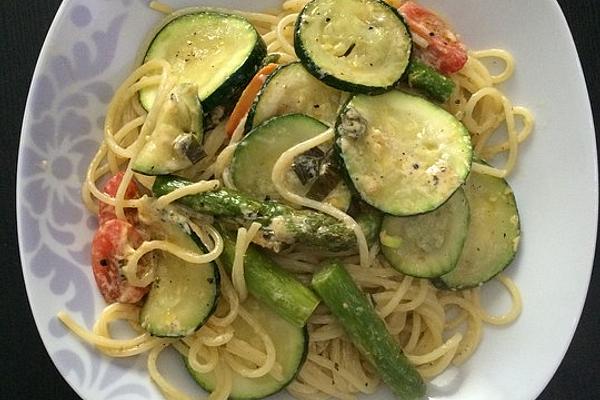 Colorful Pasta with Green Asparagus in Cream and Lemon Sauce
