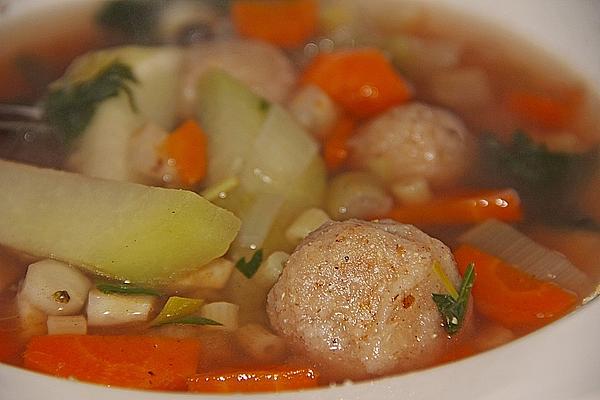 Colorful Vegetable Soup with Noodles and Dumplings