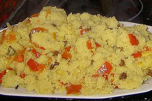 Couscous with Chicken, Raisins, Almonds and Pine Nuts