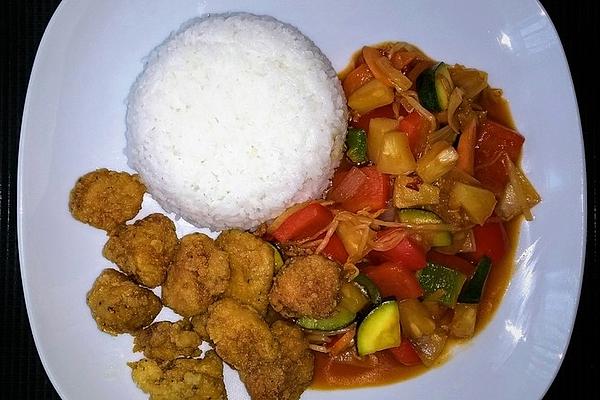 Crispy Chicken Breast Cubes with Vegetables in Sweet and Sour Sauce