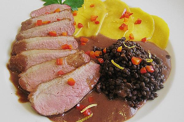 Duck Breast with Caramelized Mango Slices and Beluga Lentils