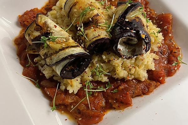 Eggplant Rolls on Bulgur with Tomato Sauce