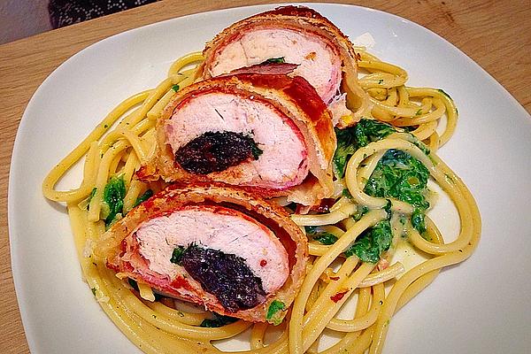 Filled Chicken Breast in Puff Pastry on Noodle-spinach Nest
