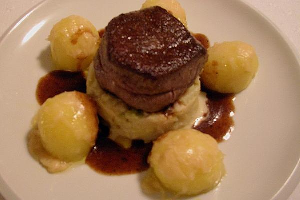 Fillet Of Beef on Savoy Cabbage with Parmesan Potatoes