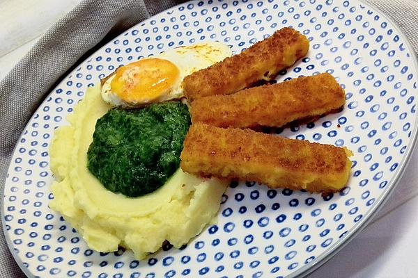 Fish Fingers on Mashed Potatoes and Spinach with Fried Egg