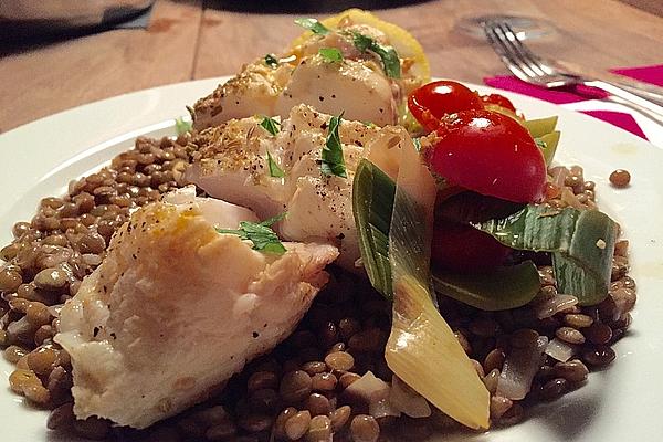 Fish with Leek and Tomatoes on Bed Of Lentils