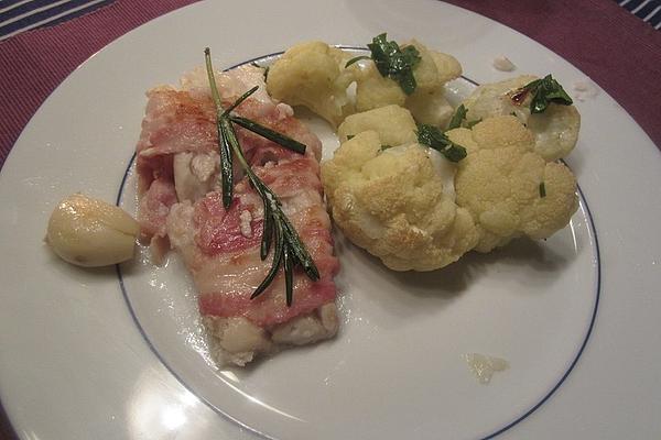 Fish Wrapped in Bacon in Rosemary Butter on Roasted Cauliflower