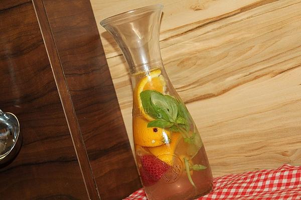 Flavored Water with Strawberries, Orange and Basil