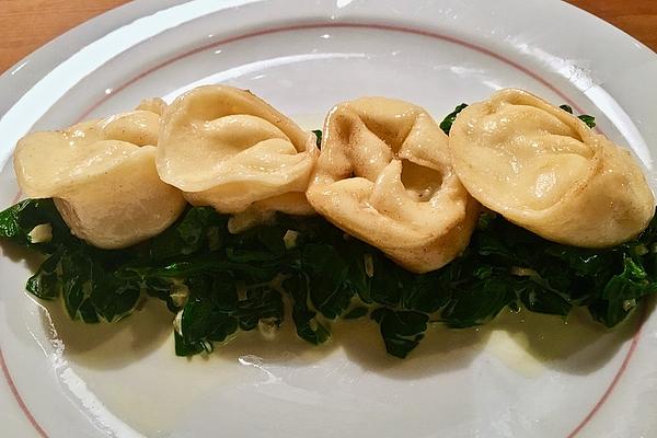 Fontina Tortellini with Spinach Leaves, Parmesan Foam and Truffle