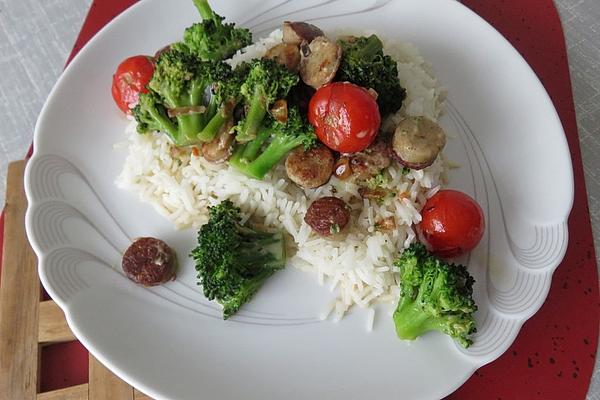 Fried Broccoli with Cherry Tomatoes, Feta, Coarse Sausage and Fennel Seeds