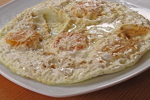 Fried Eggs Gratinated with Cheese