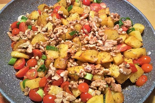 Fried Potatoes with Walnuts and Cherry Tomatoes