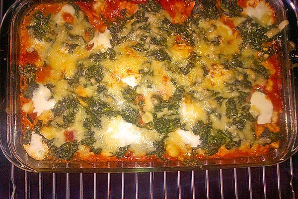 Gnocchi Casserole with Tomato Sauce, Gorgonzola and Spinach Leaves