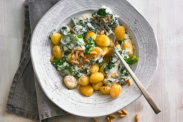 Gnocchi with Spinach Cream Sauce and Pine Nuts