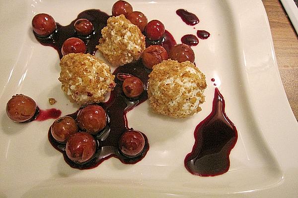 Goat Cheese Balls on Grapes in Red Wine Syrup