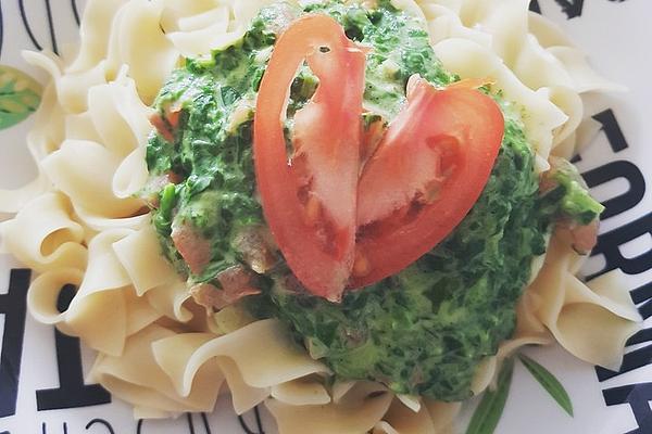 Healthy Pasta Dish with Spinach Leaves and Tomatoes