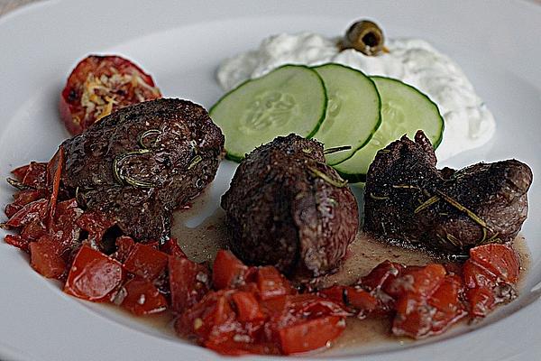 Lamb Steaks on Tomato Bed